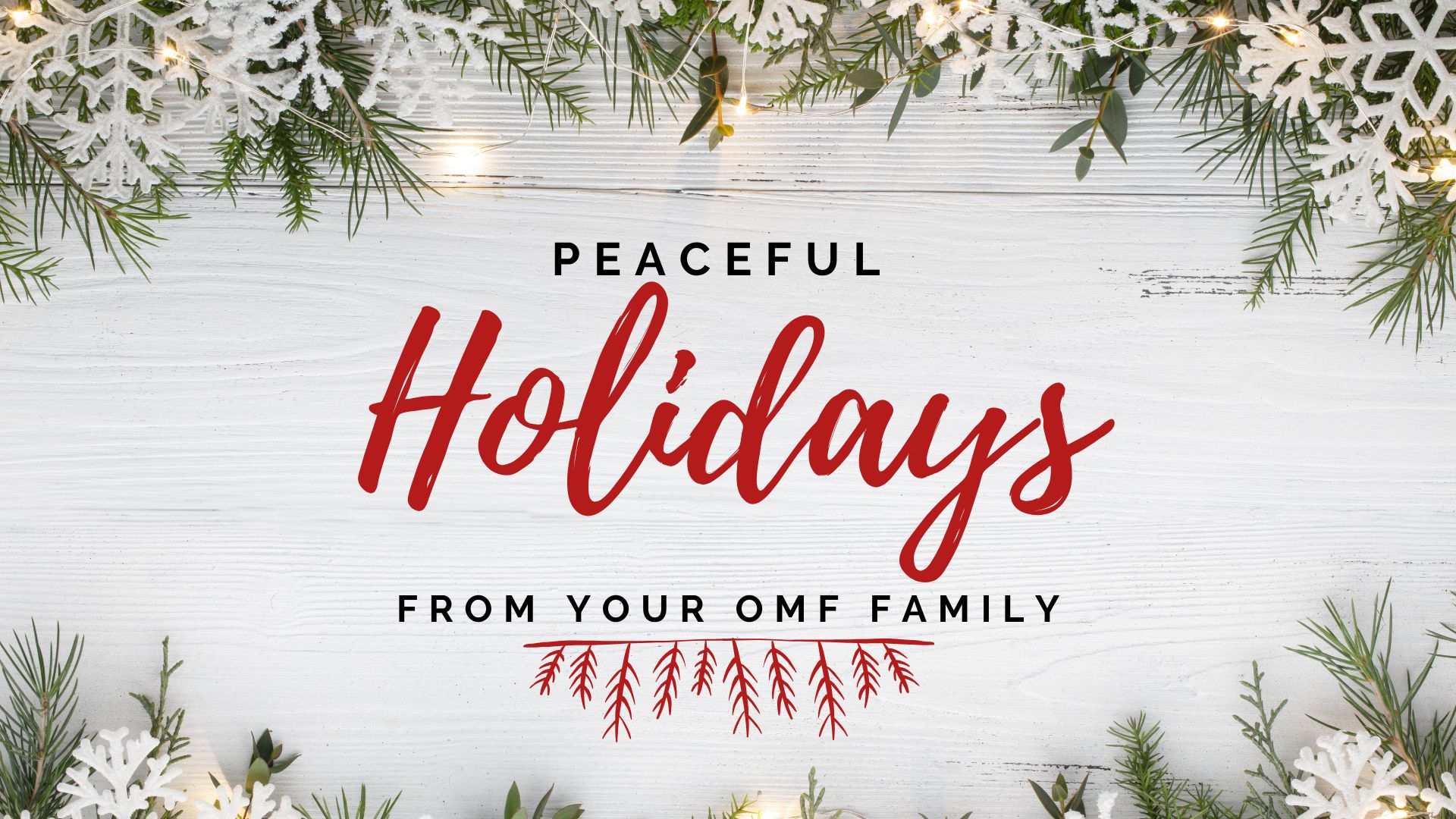 Holiday greeting graphic with greenery and lights framing the message, “Peaceful Holidays from your OMF family.”